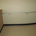 metal rails for ramp on cinder block wall