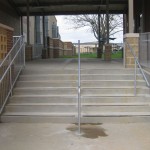 front view of outdoor metal stair rail and banister