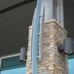 ornamental metal fixture on modern column