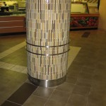 stainless steel baseboard and ornamental work on round tiled column