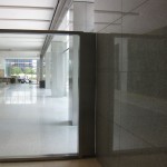looking through glass wall with metal frame