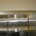 fabricated metal framing around kitchen fridge