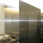 stainless steel wall with kitchen tile wall