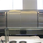 stainless steel wall and freezer with class counter top