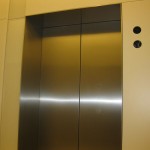 close up of stainless steel elevator frame