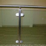 steel handrail fitting on glass